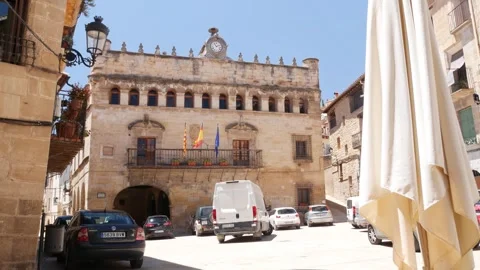 A delivery van maneuvering in front of the town hall, La Fresneda, Teruel, Spain 스톡 동영상 333937108