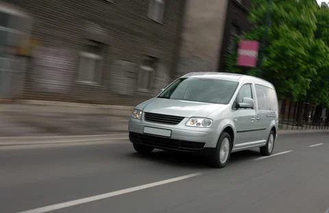 Delivery van in motion Stock Photos