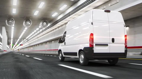 Delivery van moving inside of tunnel. Logistic and delivery concept. Stock Footage 314624213