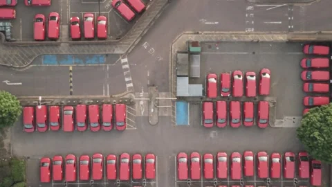 Delivery Vans Parked at the Royal Mail Office Lot in Ipswich England Drone Stock-Footage 338170284