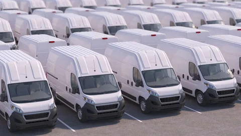 Delivery vans in a row on a parking. Express delivery service or car dealer 動画素材 277940383