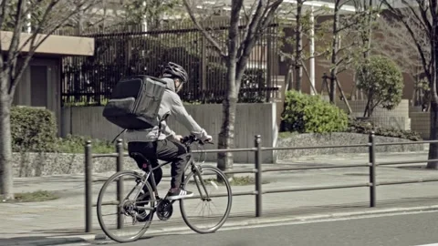 Delivery worker on bicycle Stock Footage 161815080