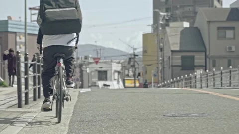 Delivery worker on bicycle Stock Footage 161815185