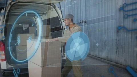 Delivery worker steadying leaning stack and placing boxes into van for loading Stock Footage 334321930