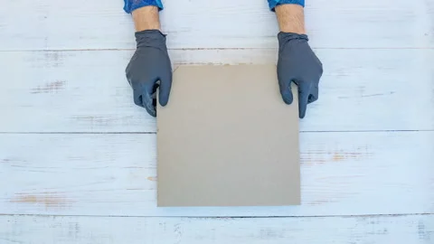 Deliveryman  holding pizza box Stock Footage 142328891