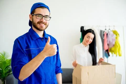 Deliveryman thumbs up Stock Photos