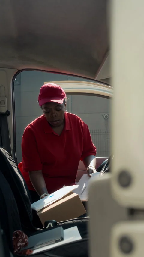 Deliverywoman Checking Form when Taking Parcels out of Car 스톡 동영상 280378906