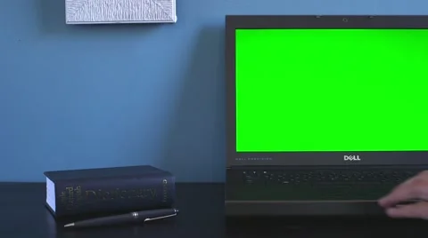 Dell computer on desk showing users hand Видео 63982313