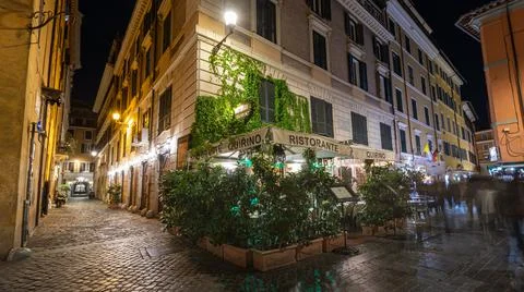 Via delle Muratte / Rome / Italy - July 4, 2019: Restaurant in Rome, outside Stock Photos