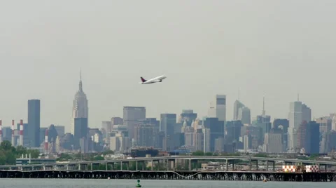 Delta Airline Airplane leaving nyc take off LaGuardia New York City Stock Footage
