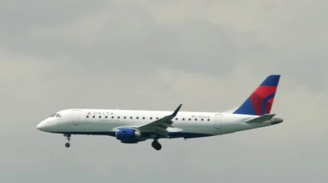 Delta Airlines Airplane approaching fly into New York City arrival Manhattan Stock Footage