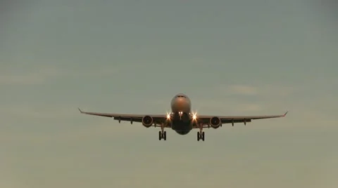 Delta Airlines flying overhead in the morning Stock Footage