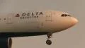 Delta Airlines landing at sunrise HD Footage