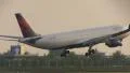 Delta Airlines landing at sunrise HD Footage