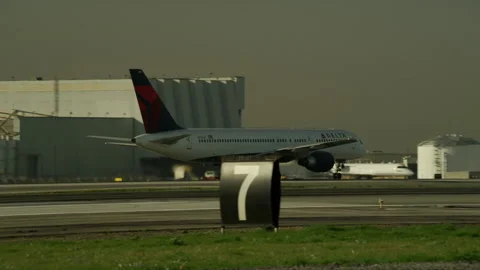 Delta airlines on runway Stock Footage 197493528