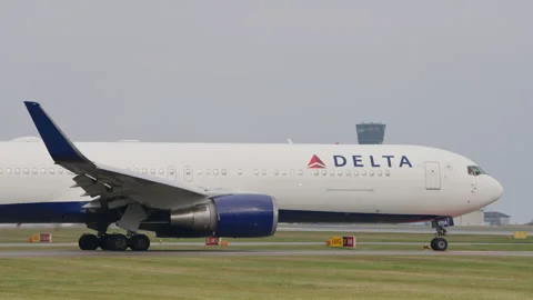 Delta Boeing 767 Passenger Airplane Taxi for Departure from Copenhagen Airport Stock Footage 286045863