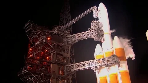A Delta IV Heavy Rocket sits on the launch pad preparing to launch the Parker Stock Footage 114249433