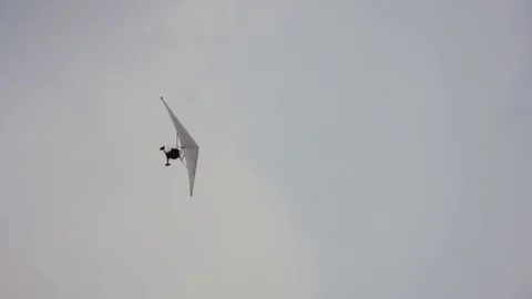 Delta plane with motor flying in circle Video stock 80590794