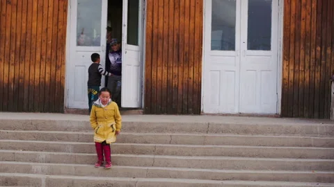 Deluun, Mongolia - November 9, 2015: After lessons in Mongolian grade school pup Video stock 199487144
