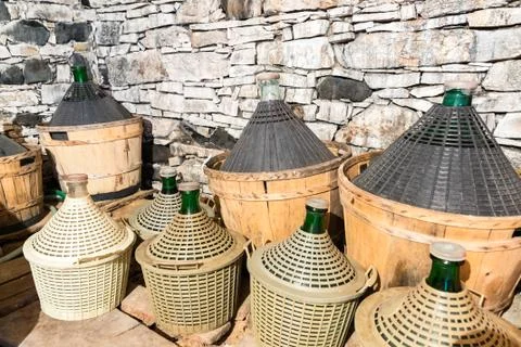 Demijohns of wine. Stock Photos