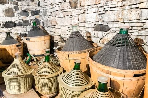 Demijohns of wine. Stock Photos