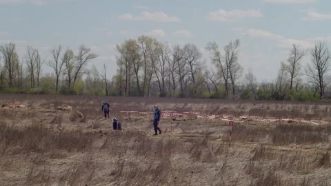 A deminers is working on mined field in Ukraine Stock Footage 240207938