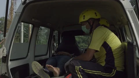 Demo of how quickly disaster relief force works in road accident Stock Footage 138360995