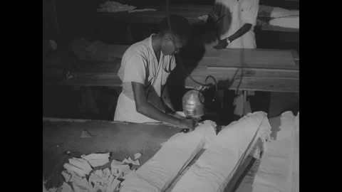DEMOCRATIC REPUBLIC OF THE CONGO - 1960s - Clothes are sewn at a cotton mill in 스톡 동영상 340592806