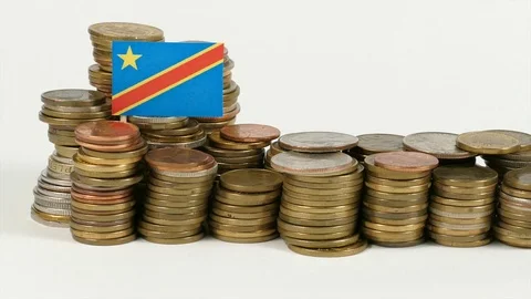 Democratic Republic of the Congo flag waving with stack of money coins Stock Footage 71877833