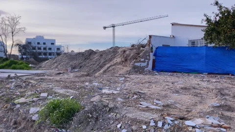 Demolished residential plot in Sanlucar de Barrameda, Spain, featuring debris Stock Footage 329097366
