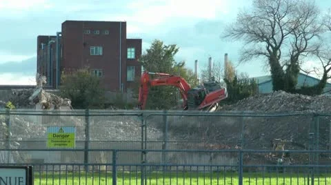 Demolishing Tower Block Digger On Rubble Stock Footage 14817379