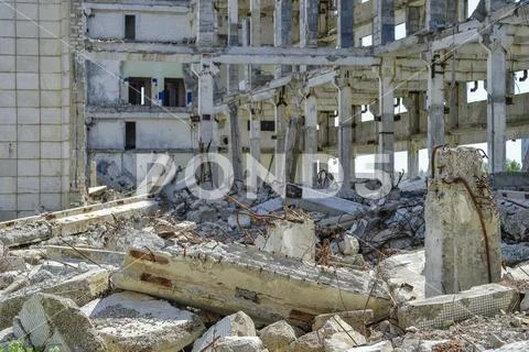 Demolition and dismantling of the remnants of the large industrial enterprise Stock Photos
