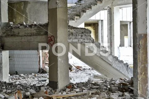 Demolition and dismantling of the remnants of the large industrial enterprise Stock Photos