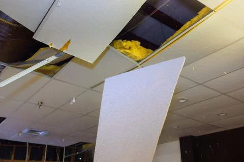 Demolition with broken internal ceilings interior building renovation project in Stock Photos