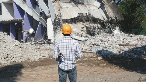 Demolition control supervisor or engineer on demolish building. Stock Footage 105023602
