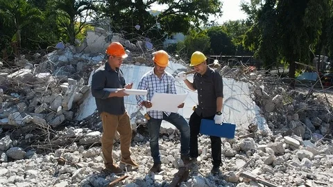 Demolition control supervisor teams and foreman discussing on demolish building. Stock Footage 107874689