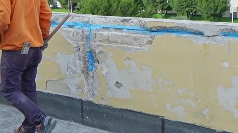 Demolition of deteriorated concrete for the structural restoration of reinfor Video stock 255511341