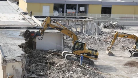 Demolition grapple while grinding part of a concrete construction Stock Footage 197002536