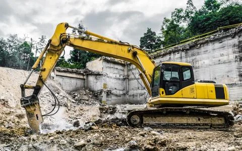 Demolition machine in action Stock Photos