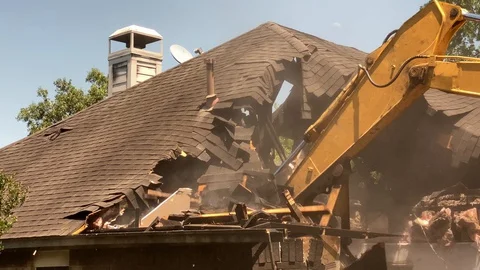 Demolition of a single family house damaged by fire Stock Footage