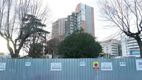 Demolition work continues on the iconic tower of Madrid's 12 de Octubre Hospital Stock Footage 325337256