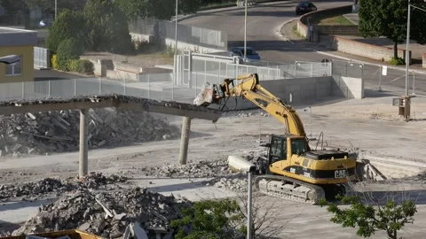 Demolition work with hydraulic grapple 2 Stock Footage 195729714