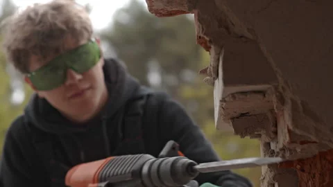 Demolition Work in Progress with Necessary Safety Gear Being Used Effectively Stock Footage 314570040