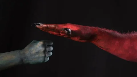 Demon and troll playing rock paper scissors game. Stock Footage 80372933