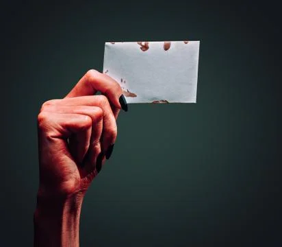 Demon hand with blank card Stock Photos