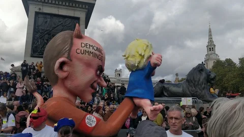 Demonic Cummings's statue at Brexit Protest London, 4K Stock Footage 118276919