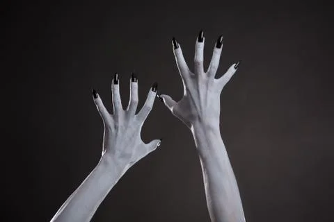 Demonic hands with black nails Stock-Fotos