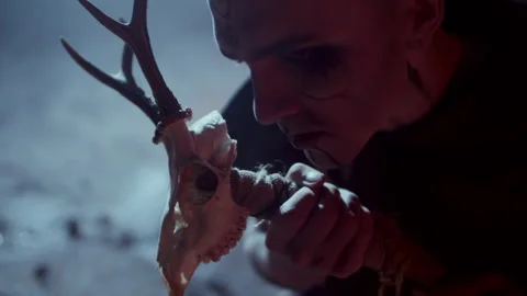 Demonic Monk in a Satanic Ritual calling demons with his staff 스톡 동영상 259803483