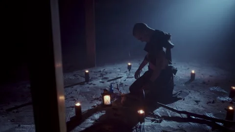 Demonic Monk in a Satanic Ritual calling the devil Video stock 259827671