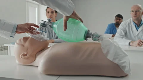 Demonstrating Artificial Ventilation Process To Students Stock Footage 223927891
